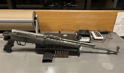 Loaded semi-automatic rifle found by Santa Rosa police K-9 during traffic stop